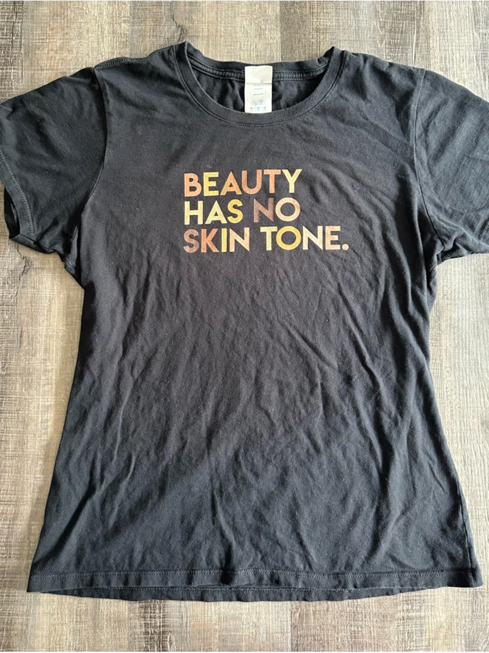 "Beauty Has No Skin Tone" - Black with Multicolor Text